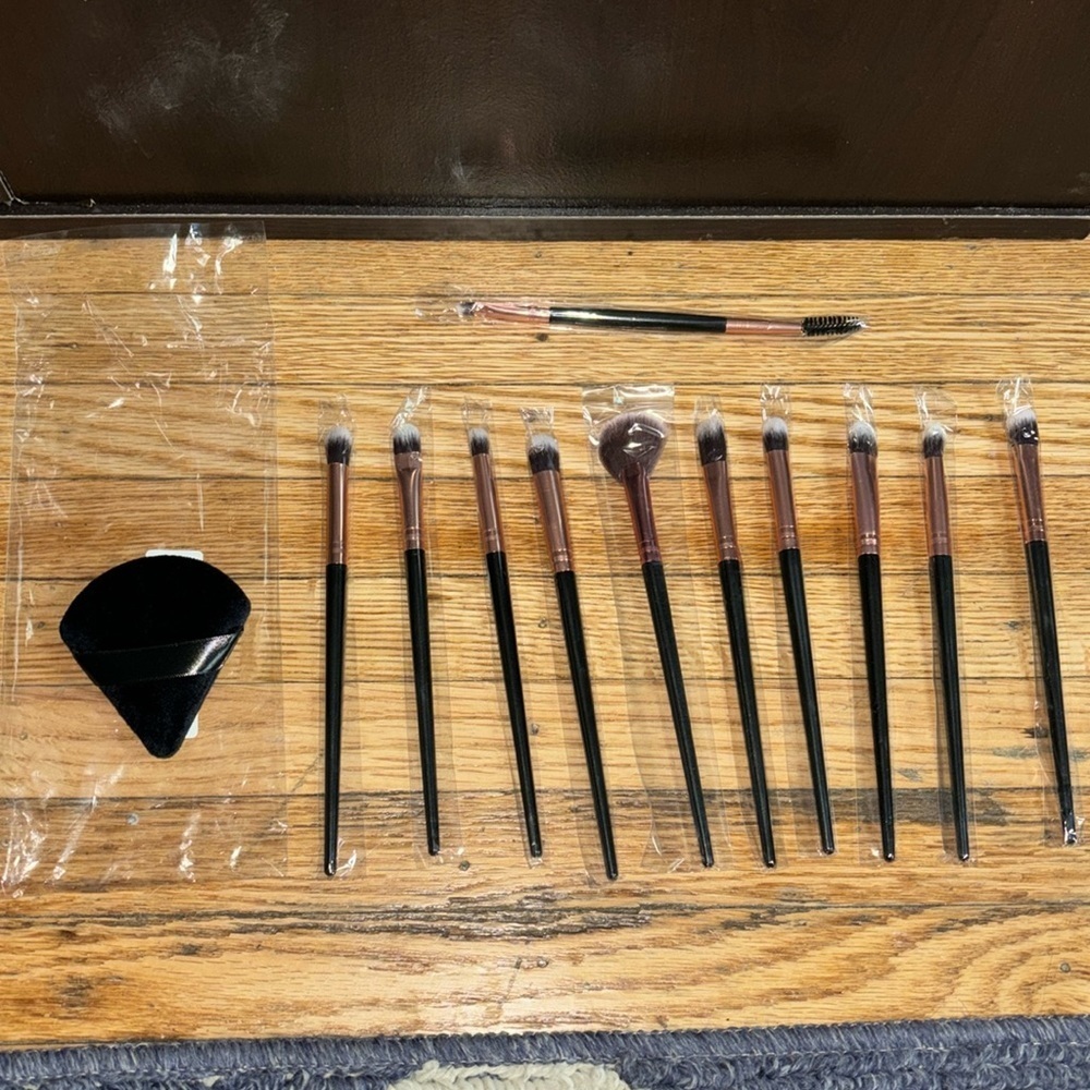 11 piece makeup brush assorted set with powder puff.